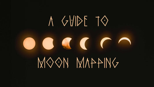 A photo showing glowing phases of the moon against the night sky with the words "A Guide to Moon Mapping" written across it. 